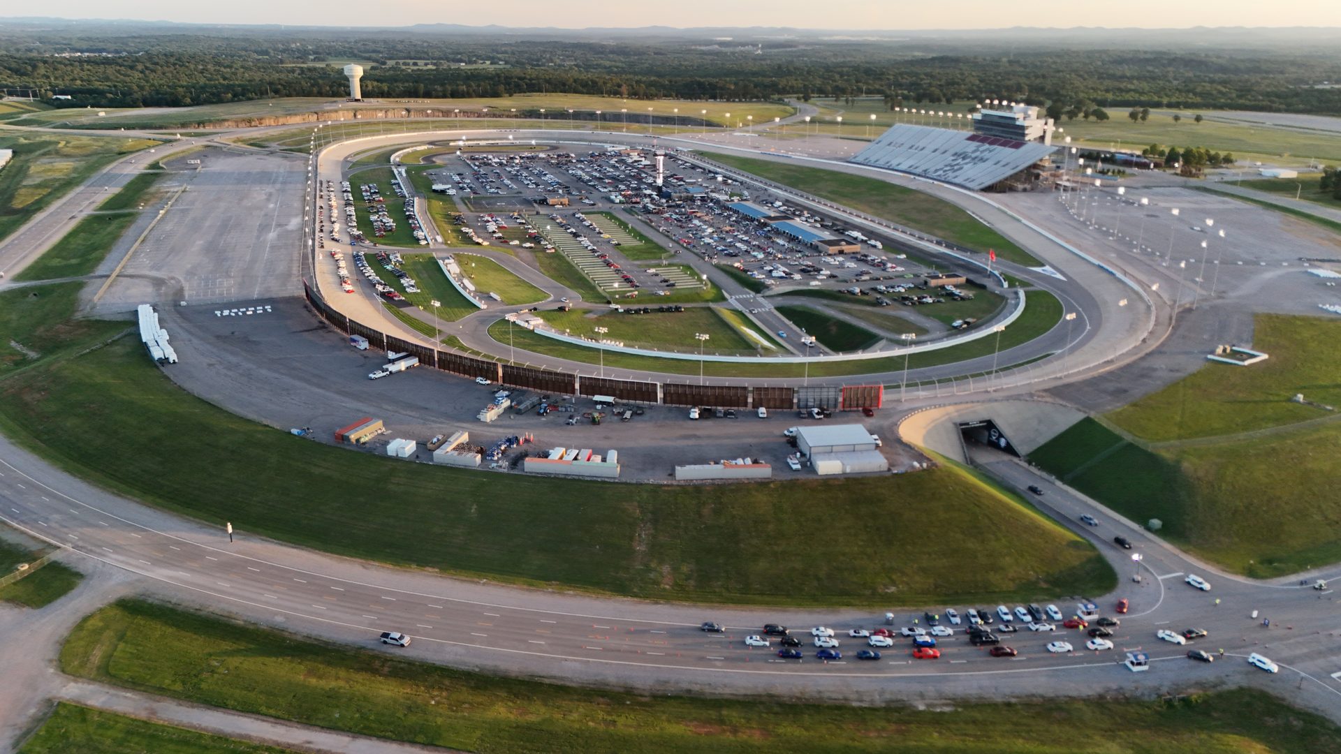 Dusk aerial of a motorsports speedway captured by a UUAS drone